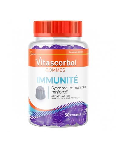 VITASCORBOL Gommes Immunité-flacon transparent avec étiquette rouge et blanche, illustration des gommes violettes