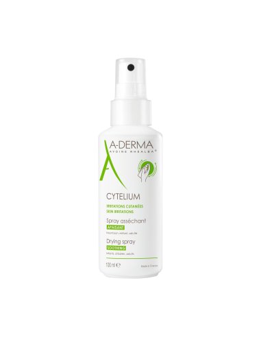 A-DERMA CYTELIUM Spray Asséchant Peaux Irritées et Réactives - Flacon spray blanc et vert avec une main tenant le flacon.