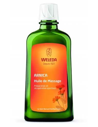 WELEDA Huile de Massage à l'Arnica - Flacon vert bouteille, étiquette orange avec des fleurs et bouchon blanc